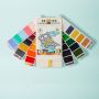 Superior China Style 32/56 Colors Solid Watercolor Paint Set Pocket Travel Bright Color Fan Shape Paint Set With Paint Brush