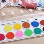 factory hot selling 12 colors solid watercolor paint palette with transparent PVC box