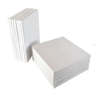 various sizes of artist painting stretched canvas